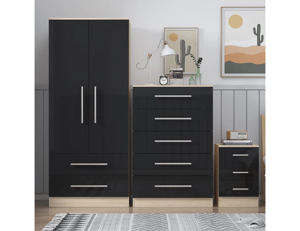 Black bedroom furniture trio set featuring a two door wardrobe, chest of drawers and matching bedside cabinet with oak effect trim