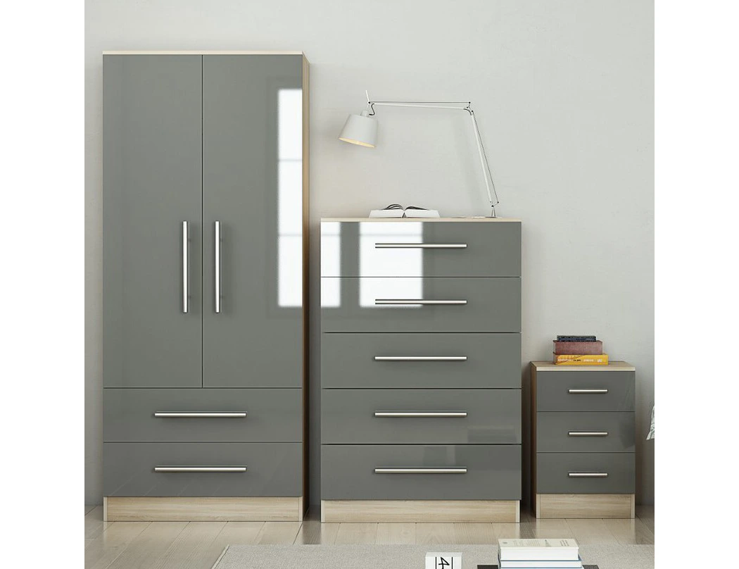 Grey bedroom furniture trio set featuring a two door wardrobe, chest of drawers and matching bedside cabinet with oak effect trim